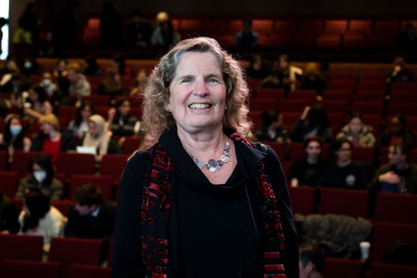 Kathleen Wynne standing in front an audience at Isabel Bader Theatre.